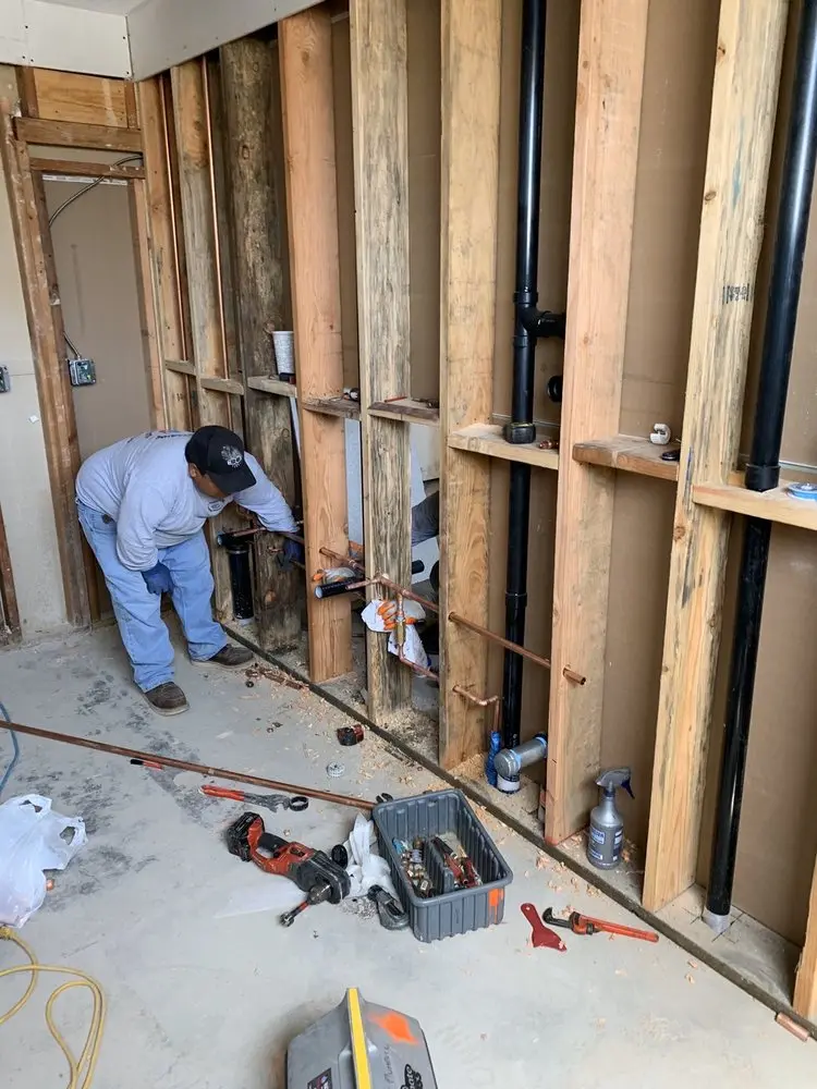 Commercial rough-in plumbing for Water Heater Replacement in Mounds View